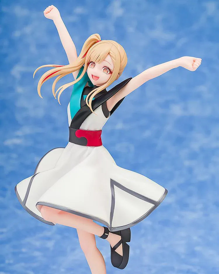Kaguya Collaboration Concert Ver. figure with blonde hair, raised arms, a white dress with turquoise and black accents, and black ankle-strap shoes.
