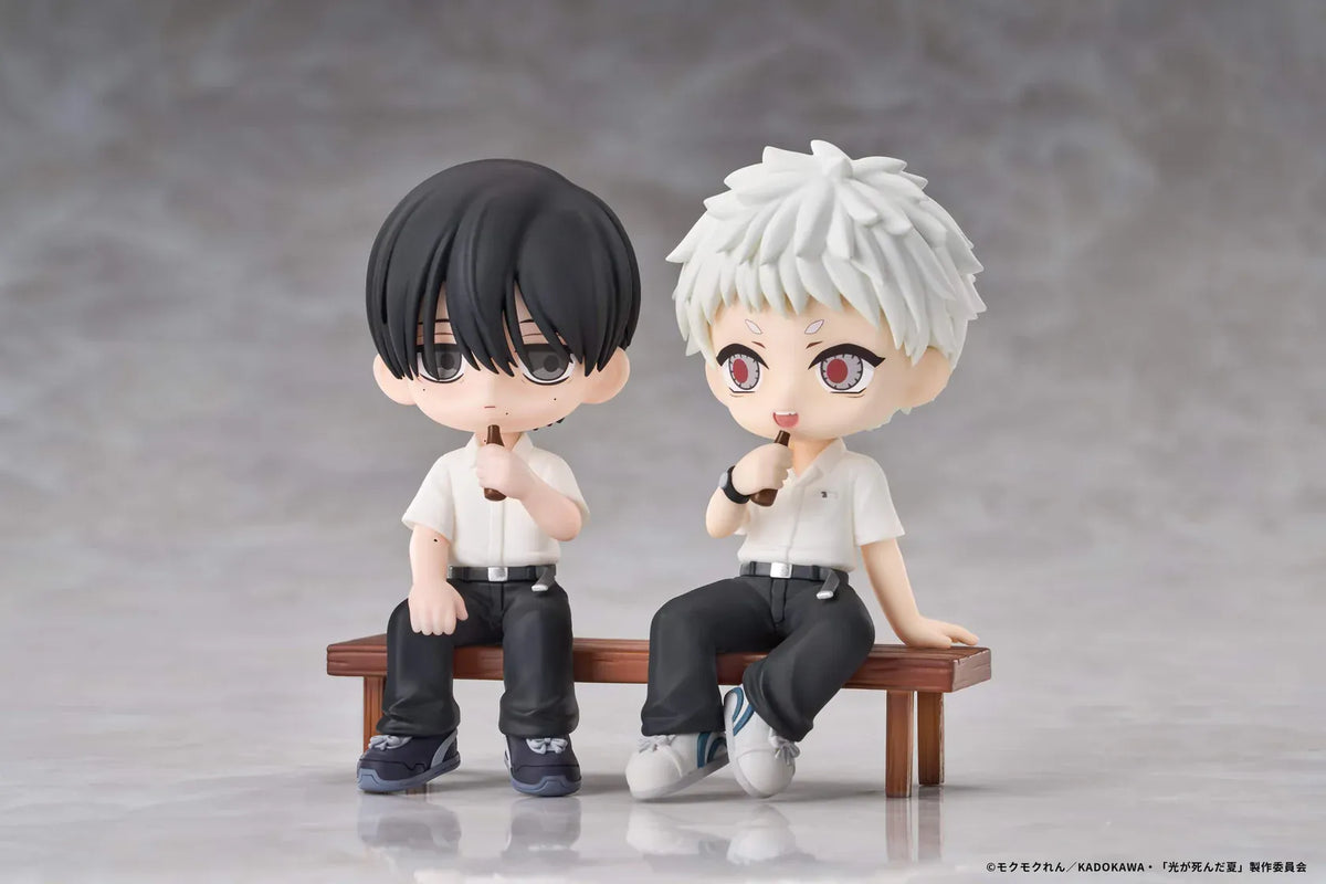The Summer Hikaru Died Yoshiki & Hikaru Chibi Figure featuring black-haired Yoshiki and white-haired Hikaru sitting together on a wooden bench while enjoying frozen treats in front of a Japanese ice cream shop with a red and white striped awning and transparent display base.