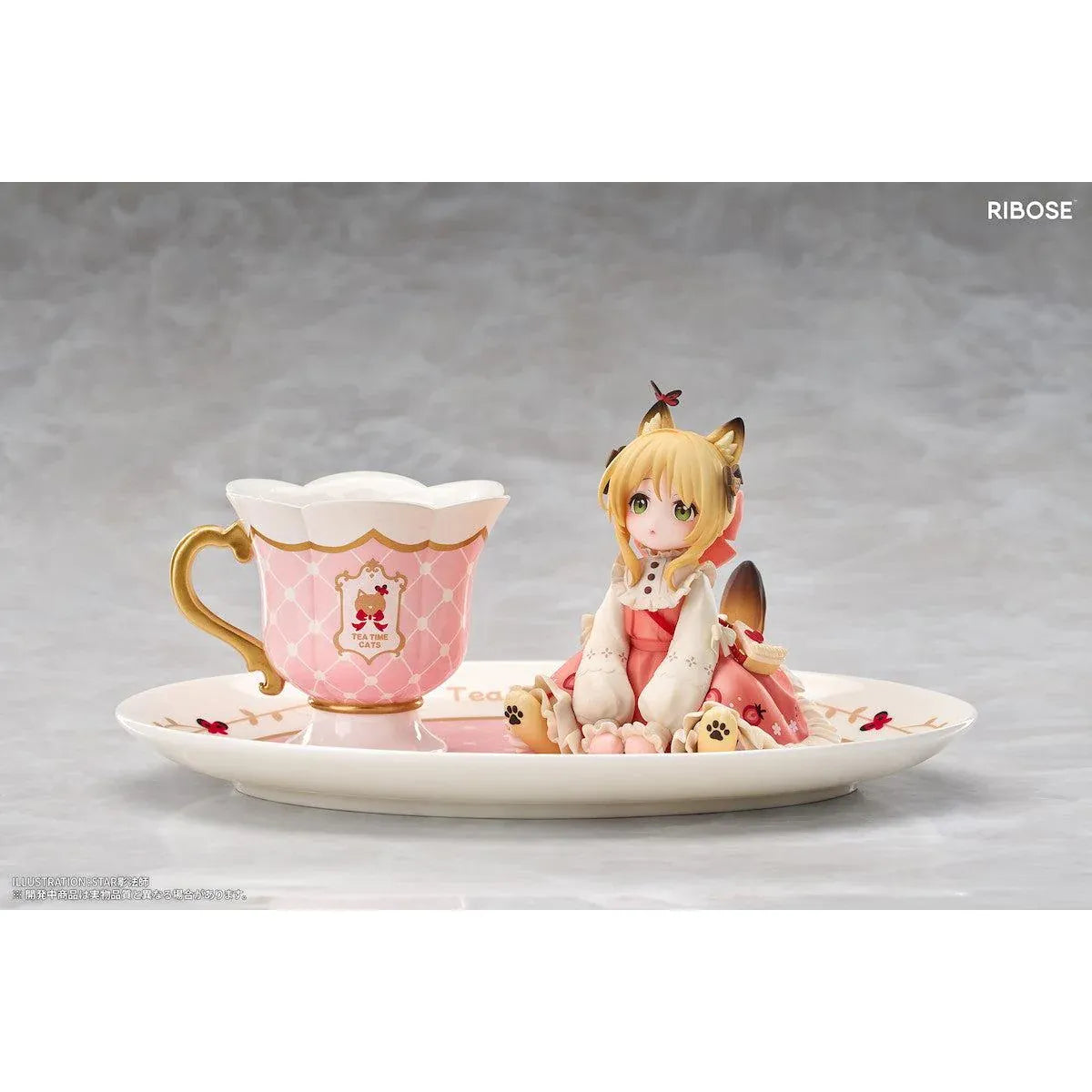 DLC Series Tea Time Cats Orange Cat Non Scale Figure by RIBOSE featuring an orange-haired cat girl with green eyes, a pink outfit, fluffy cat ears, and paw-shaped sleeves sitting beside a decorative pink teacup on a matching serving tray.