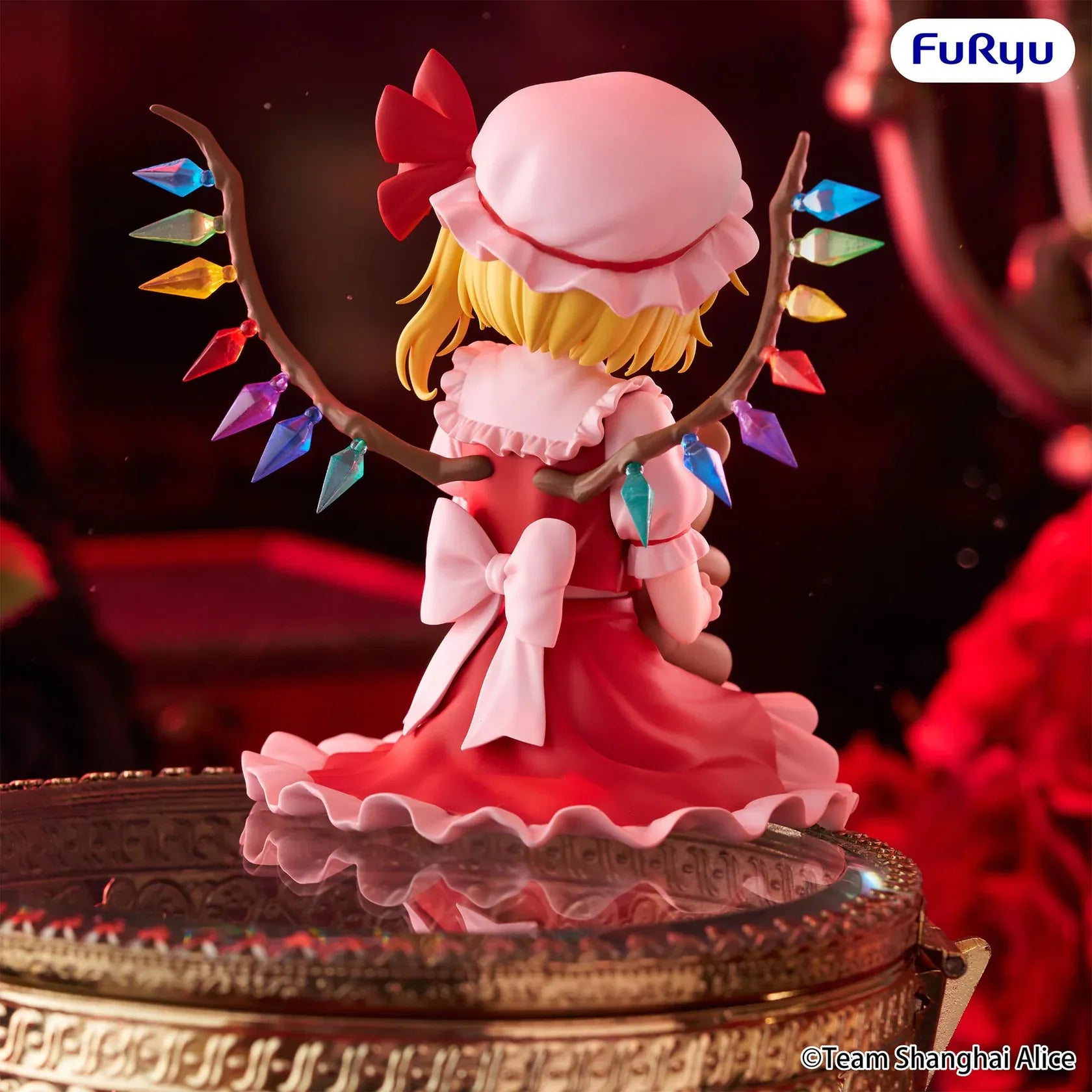 Touhou Project Flandre Scarlet Noodle Stopper figure holding a teddy bear with colorful crystal wings and a seated pose