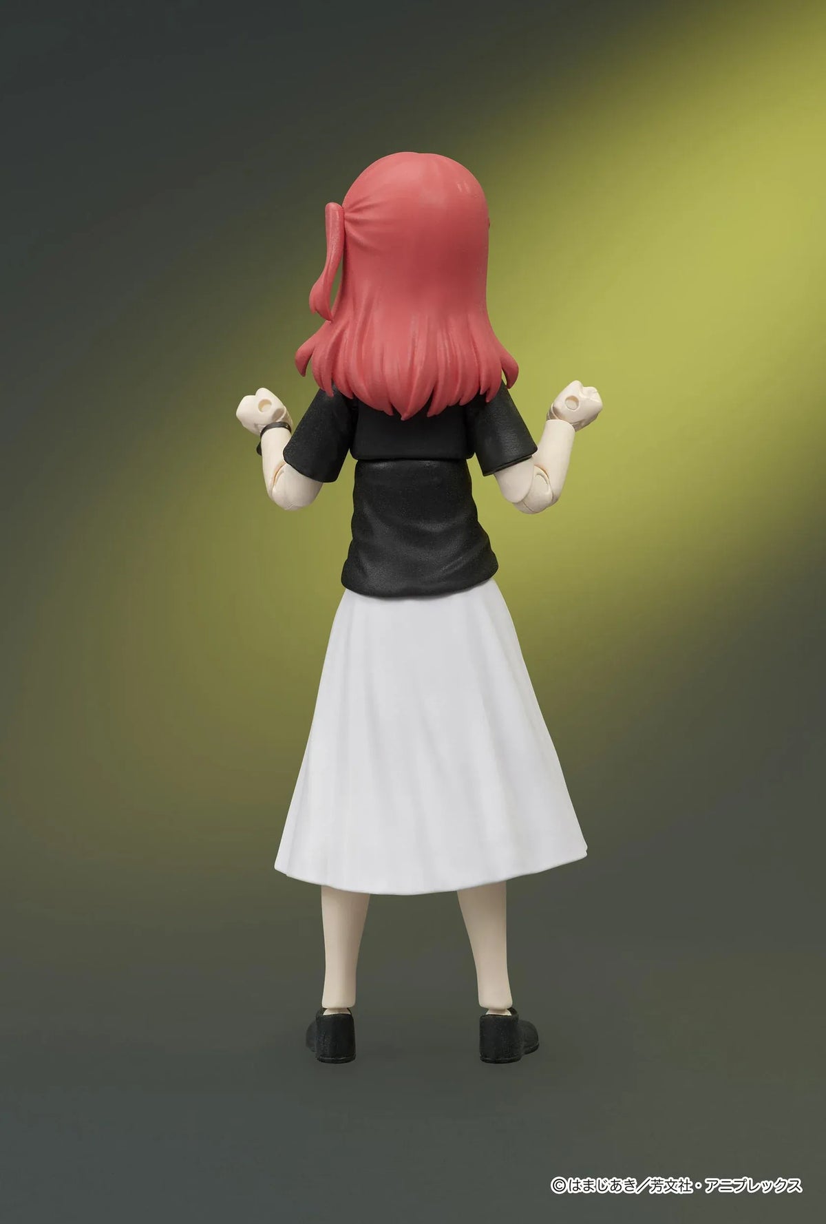 Bocchi the Rock! DIGACTION Ikuyo Kita figure winking while holding a light blue guitar, wearing a black band T-shirt and white pleated skirt.