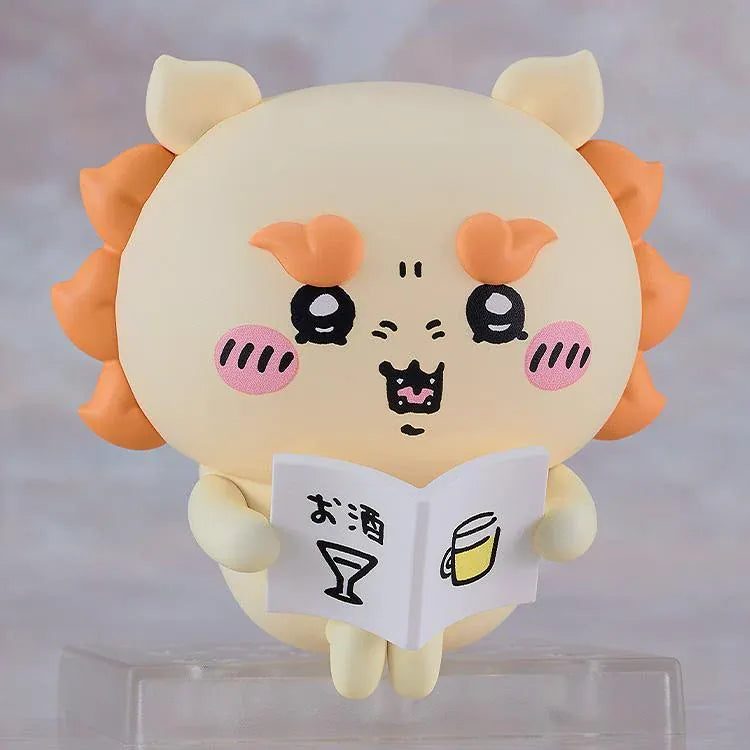 Chiikawa Nendoroid Shisa figure with a cream-colored body, orange mane and eyebrows, pink cheeks, and a joyful smiling expression.