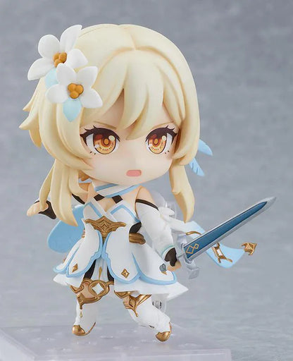 Genshin Impact Nendoroid Traveler Figure Lumine Rerelease featuring Lumine with blonde hair, golden eyes, white-and-blue fantasy outfit, flower hair accessory, and sword accessory.