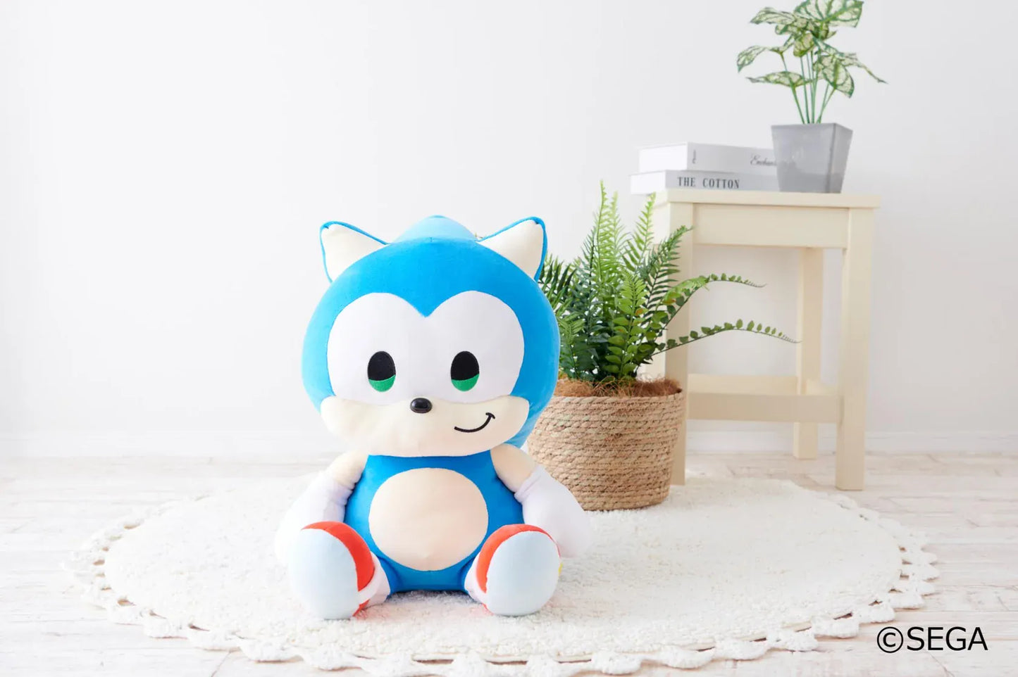 Sonic & Friends Sonic large plush with green eyes, white gloves, red shoes, and a seated pose.
