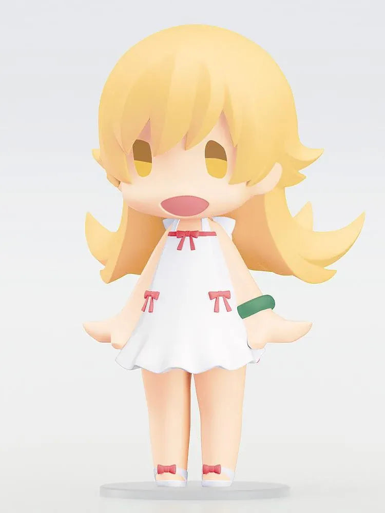 Monogatari Series HELLO! GOOD SMILE Shinobu Oshino Figure featuring a blonde-haired anime girl with golden eyes, a cheerful expression, white dress decorated with red bows, and matching shoes in a cute chibi design.