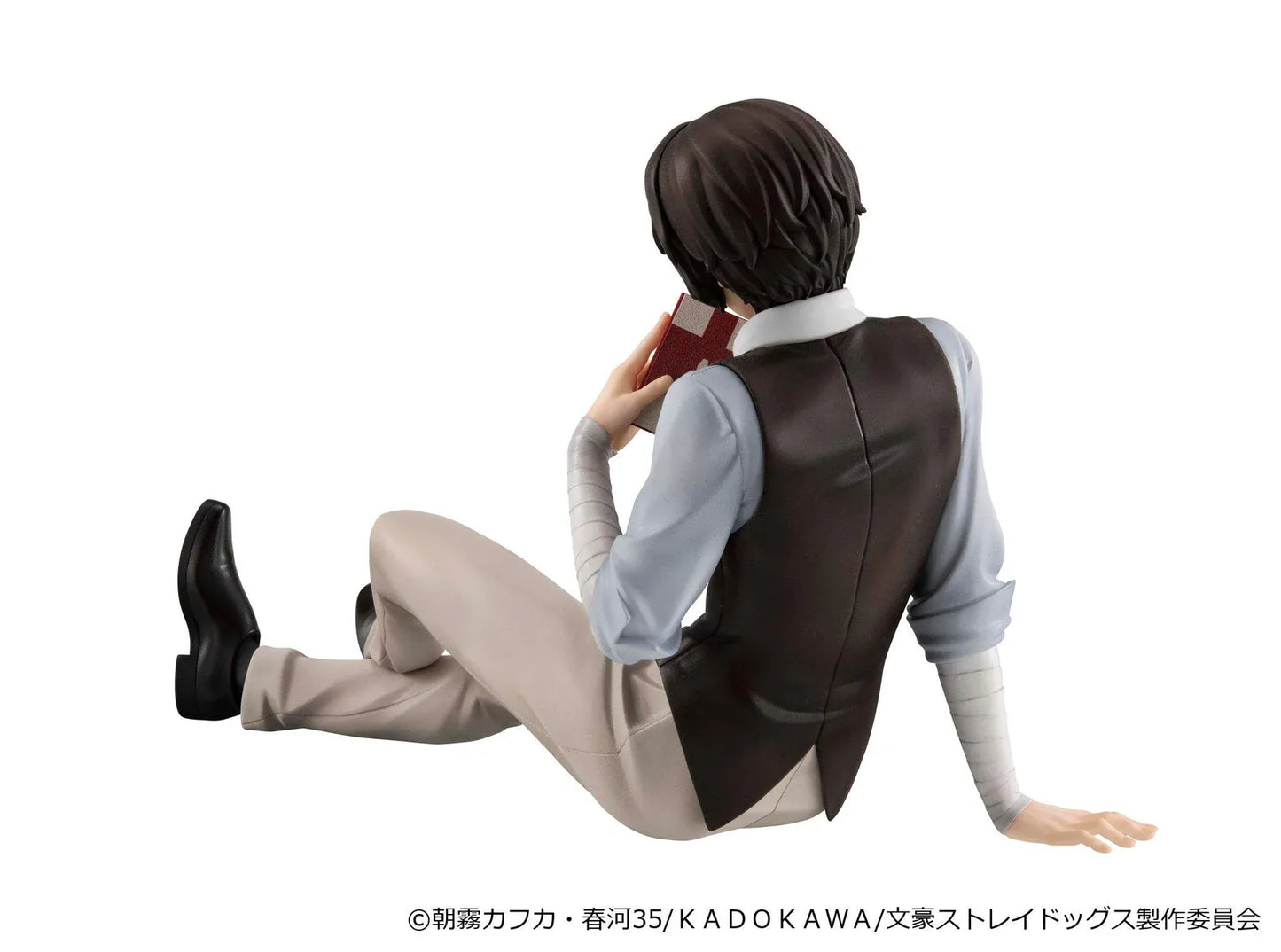 Bungo Stray Dogs G.E.M. Series Dazai-san Palm Size Figure seated and holding a book