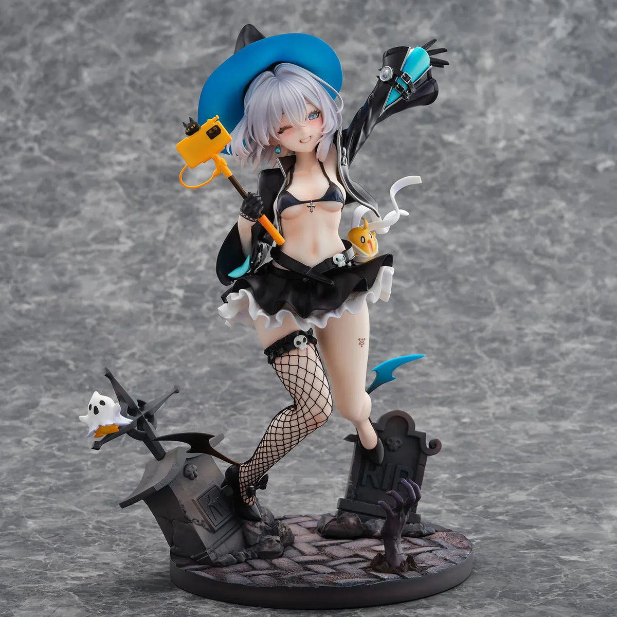Azur Lane Jade 1/6 scale figure with silver hair, a blue witch hat, and a black ruffled outfit posed above a detailed graveyard base.