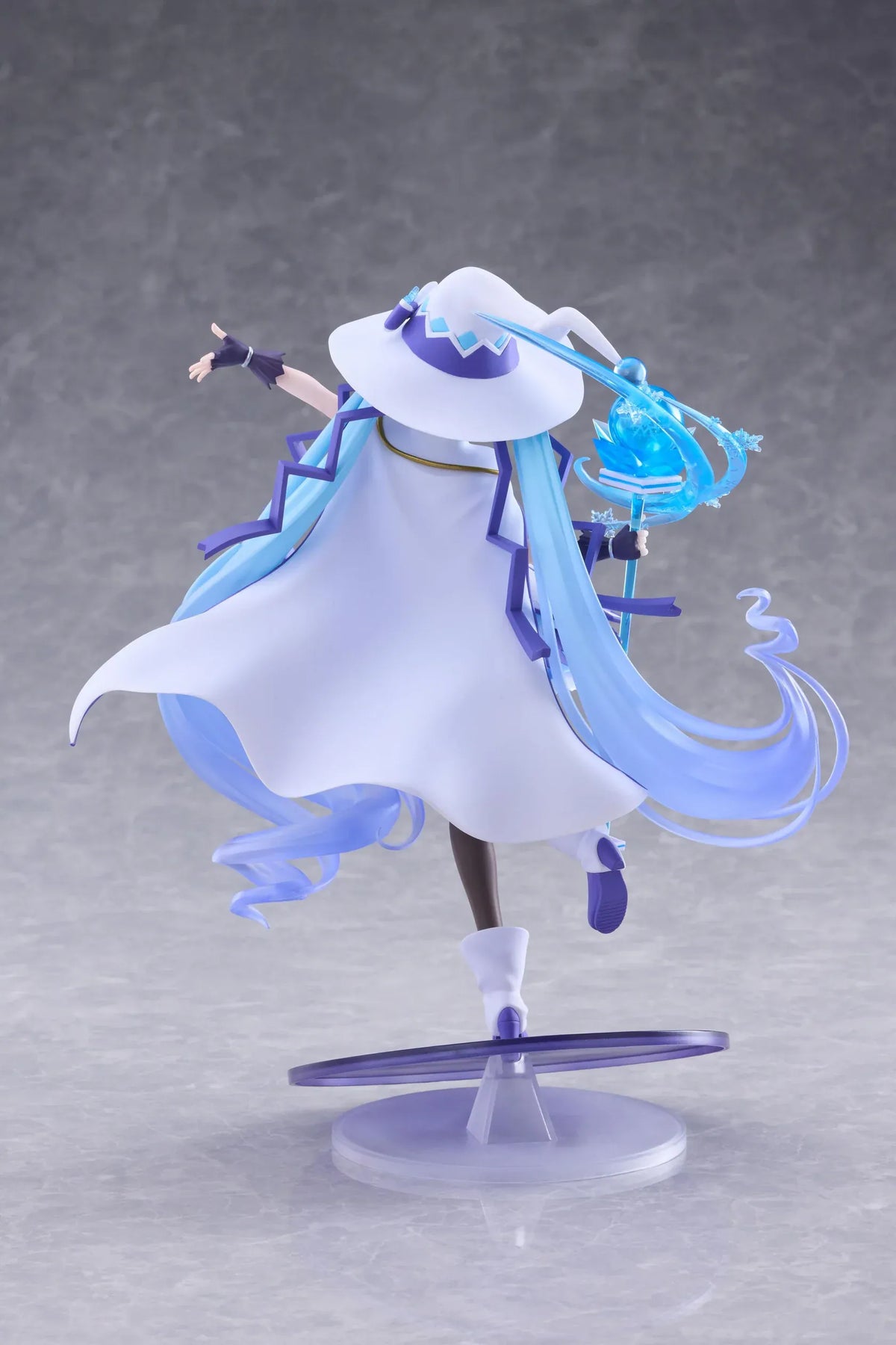 Snow Miku All Stars 2014 Ver. AMP+ figure wearing a white-and-blue snow sorceress outfit and holding a translucent magical staff.