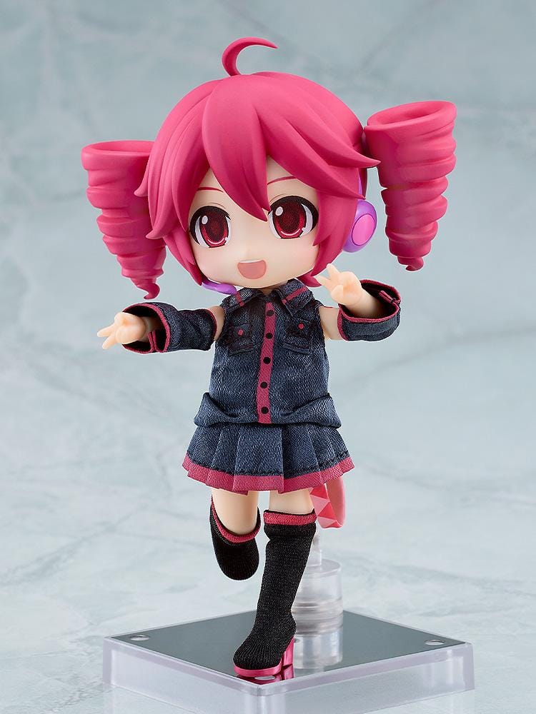 Kasane Teto Nendoroid Doll with pink drill-shaped twin tails, a headset microphone, and a dark fabric outfit with pink trim, posed waving.