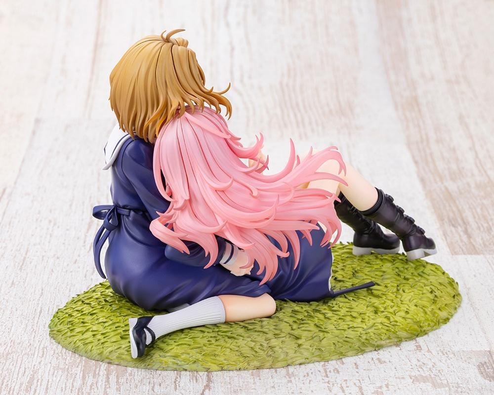I Want to Love You Till Your Dying Day Sheena & Mimi 1/8 Scale Figure featuring pink-haired Sheena smiling with her eyes closed while leaning against blonde-haired Mimi. Both wear navy-blue school-inspired dresses and sit together on a textured grassy display base decorated with a white daisy flower crown.