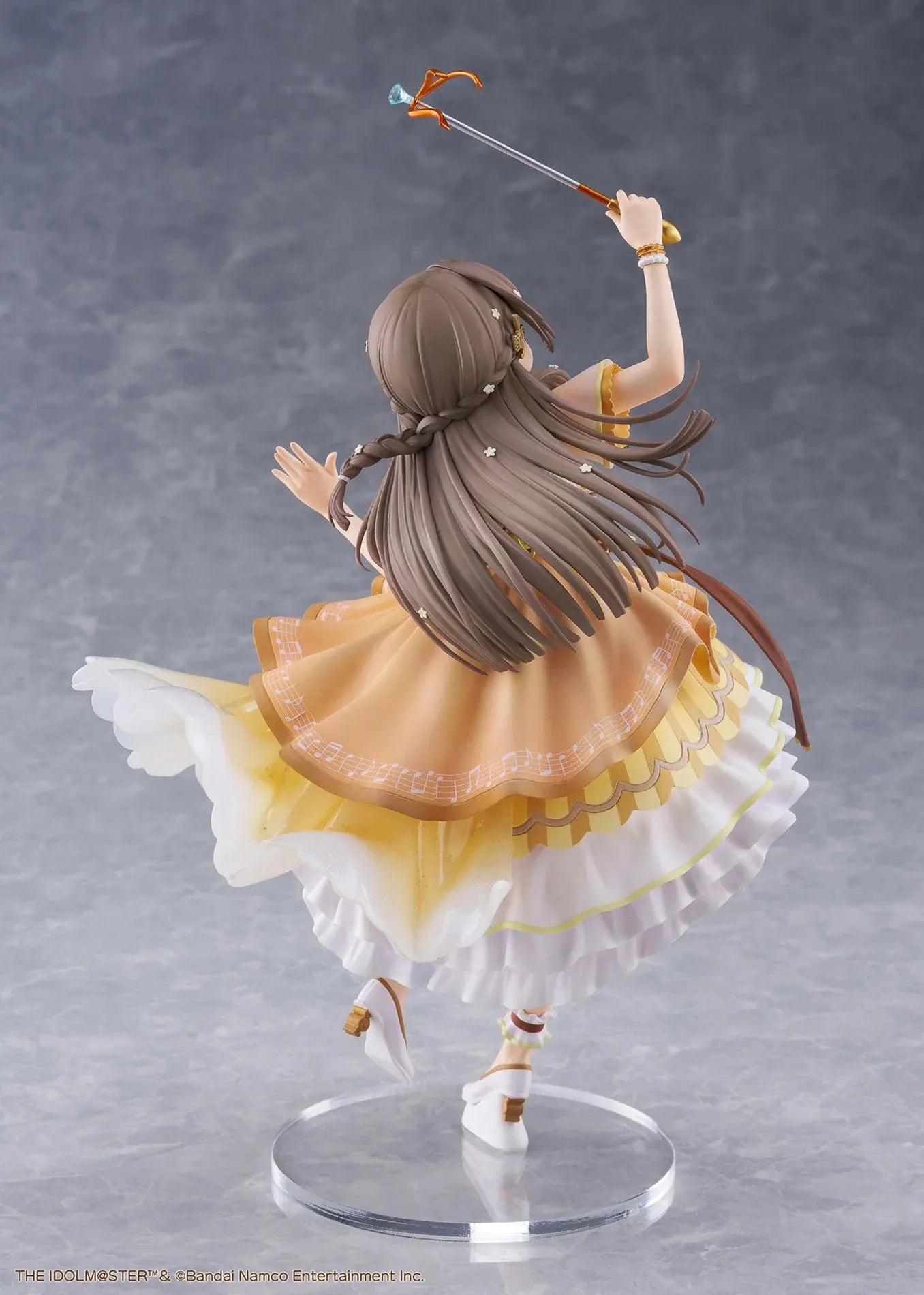 The Idolmaster Gakuen China Kuramoto 1/7 scale anime figure in a flowing yellow stage dress holding a microphone