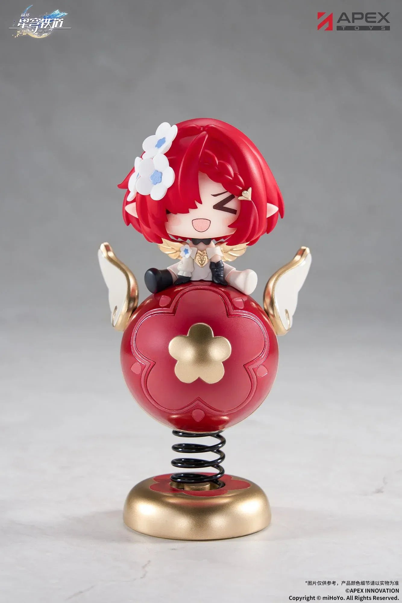 Honkai Star Rail Tribbie Chibi Chara Yurayura Stand Non-Scale Figure with red hair, flower details, red-and-gold spring base, and chibi design