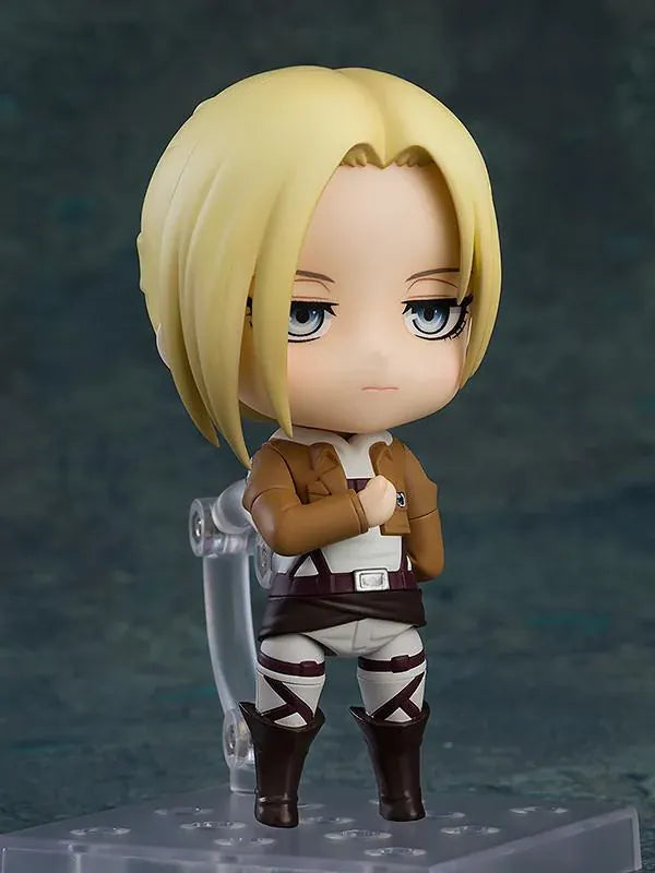 Attack on Titan Nendoroid Annie Leonhart rerelease figure with blonde hair, military uniform, dual blades, and vertical maneuvering equipment.