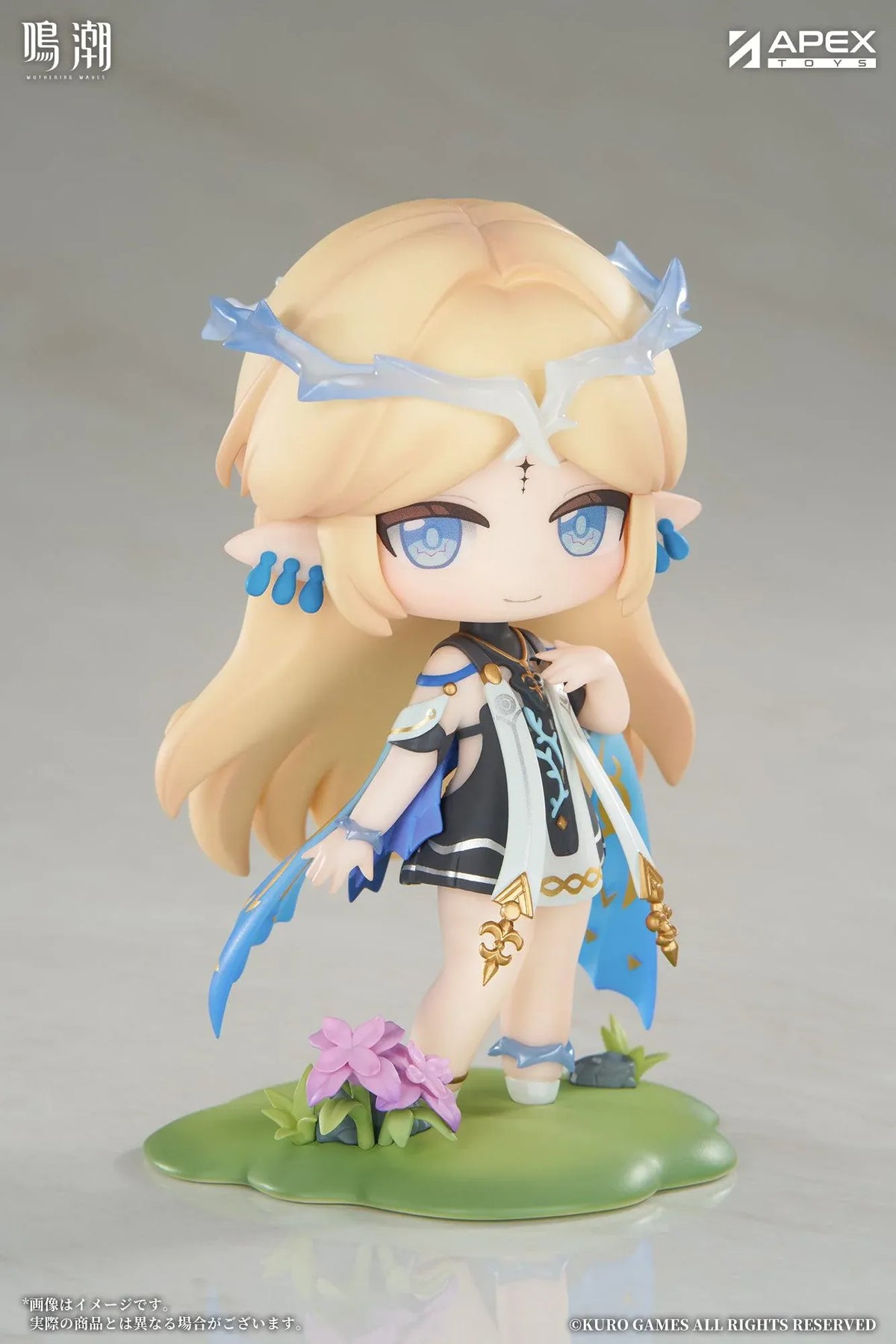 Chibi Cartethyia Jinseki Series figure with blonde hair, blue eyes, a pale blue headpiece, and a small armored companion, standing on a green floral base.
