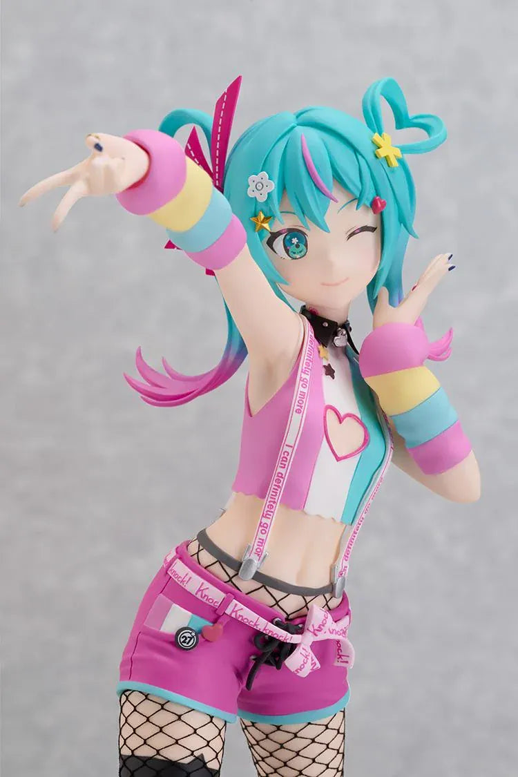 Hatsune Miku DecoMiku Lightness L Size figure with turquoise and pink twin-tails, a colorful cropped top, pink shorts, and black boots.