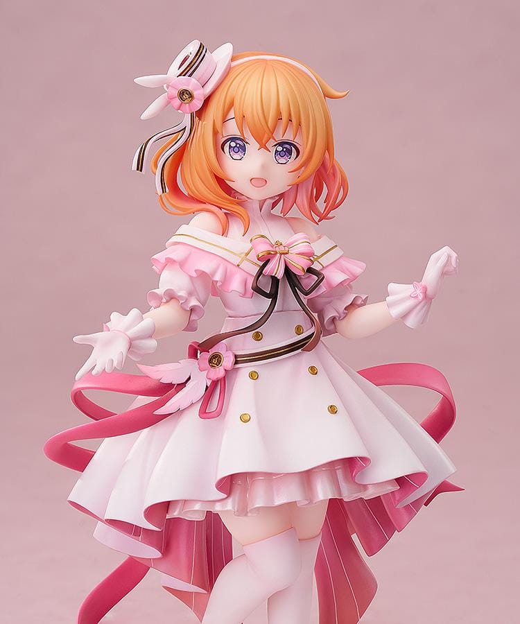 Is the Order a Rabbit Cocoa Dress Ver. 1/7 Scale Figure wearing an elegant pink and white frilled dress with ribbons and floral accessories