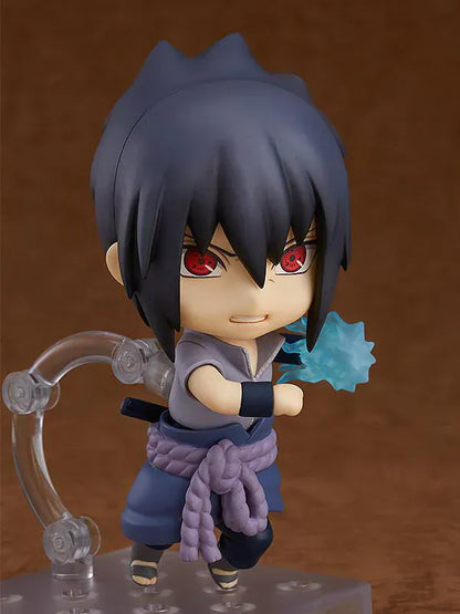 Chibi Nendoroid Sasuke Uchiha holding his sword in his Shippuden outfit.