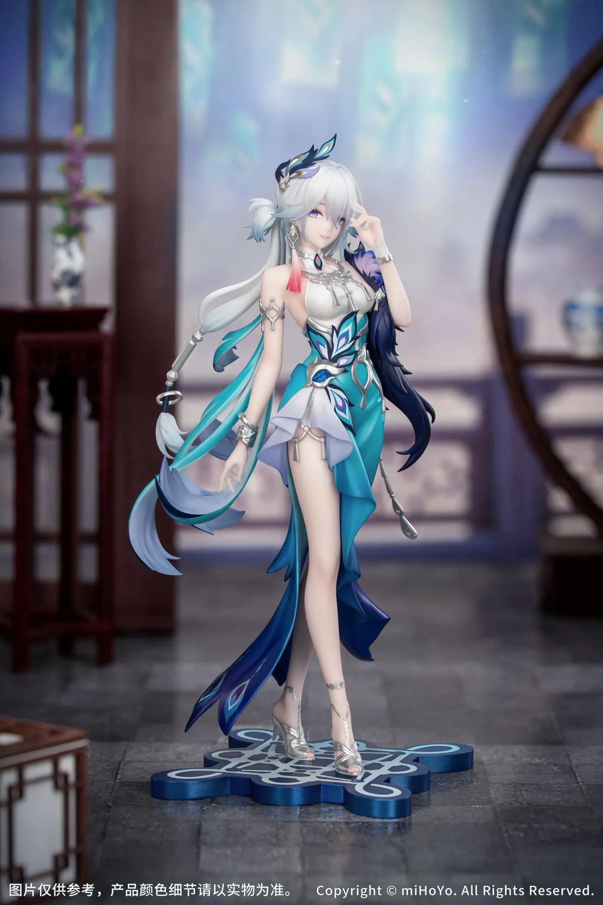 Yao Guang 1/8 scale figure wearing an elegant white-and-teal outfit with silver ornaments and feather-inspired decorations.