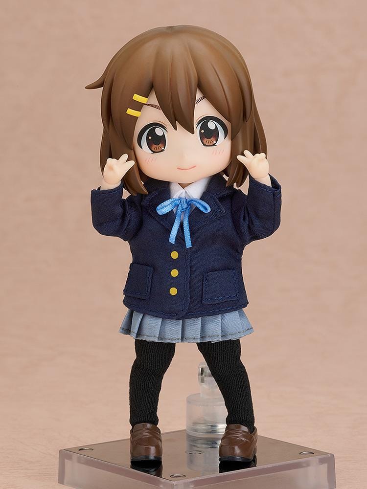 K-ON Nendoroid Doll Yui Hirasawa wearing her Sakuragaoka High School uniform with navy blazer, pleated skirt, and blue ribbon