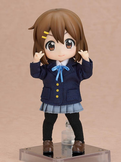 K-ON Nendoroid Doll Yui Hirasawa wearing her Sakuragaoka High School uniform with navy blazer, pleated skirt, and blue ribbon