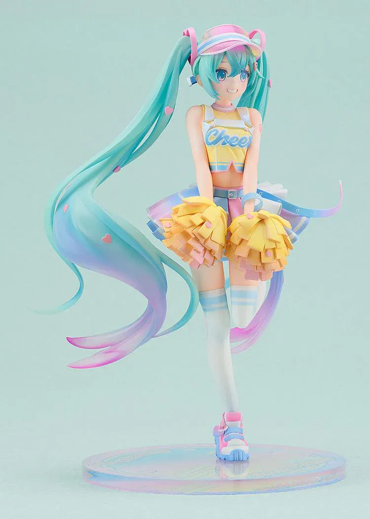 Hatsune Miku Cheerleading Ver. 1/7 scale figure holding yellow pom-poms, with turquoise twin-tails, a pastel outfit, and one leg lifted.