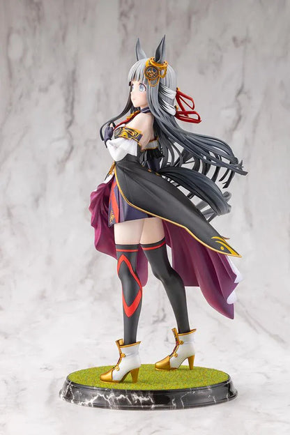 Umamusume Pretty Derby Chrono Genesis 1/7 Scale Figure featuring a silver-gray-haired horse girl with blue eyes, horse ears, and a flowing white, black, red, and gold racing outfit standing on a grassy display base.