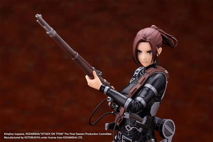 Sasha Blouse The Final Season Ver. Oshi Works figure holding a long rifle, wearing a black combat outfit with harness straps and equipment on a black base.