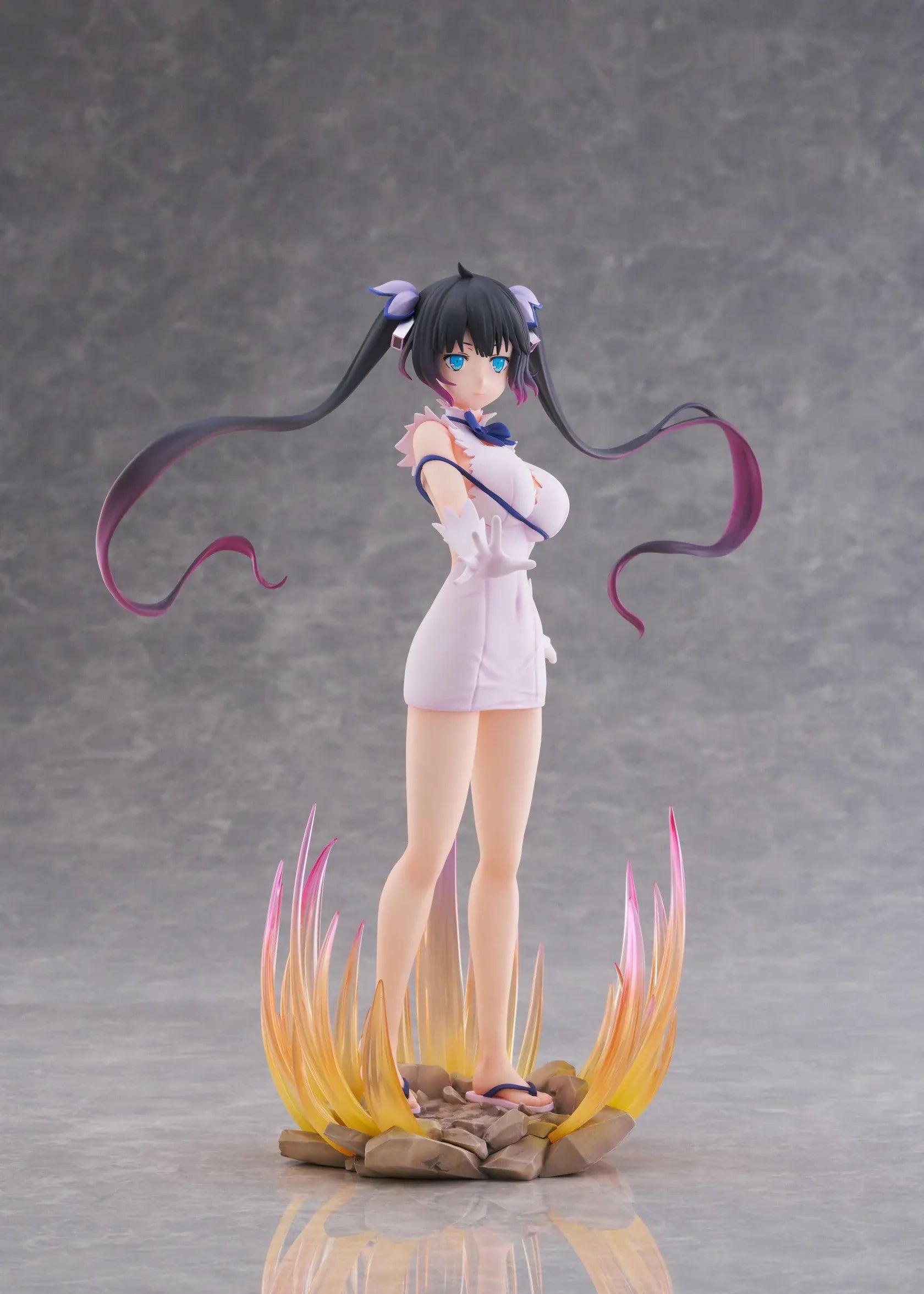 Is It Wrong to Try to Pick Up Girls in a Dungeon V Hestia Divinity Unleashed Limited Edition Ver. 1/7 Scale Figure with twin-tails, white outfit, blue ribbon accents, rocky base, and flame effect parts