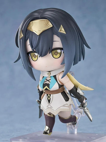 Stella Sora Nendoroid Amber Figure featuring a dark blue-haired anime girl with golden eyes wearing a white and teal outfit with gold accents, black gloves, armored boots, and holding two silver weapons.
