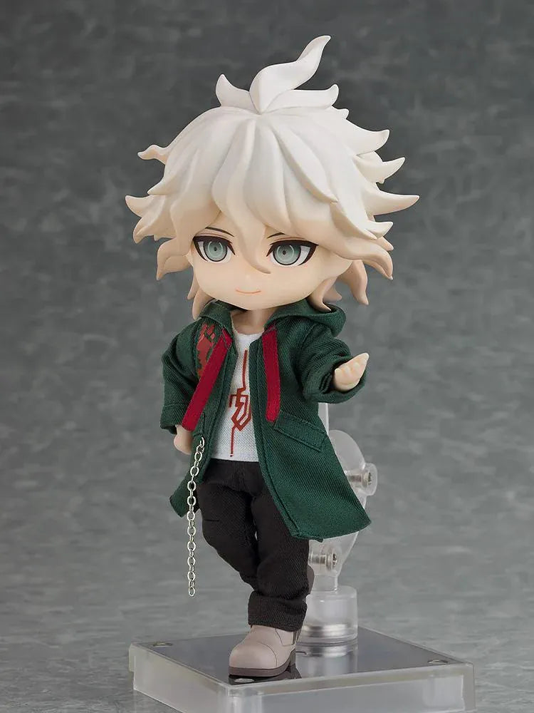 Danganronpa 2x2 Nendoroid Doll Nagito Komaeda with white hair, a dark green fabric coat, black trousers, gray shoes, and a silver-colored chain.