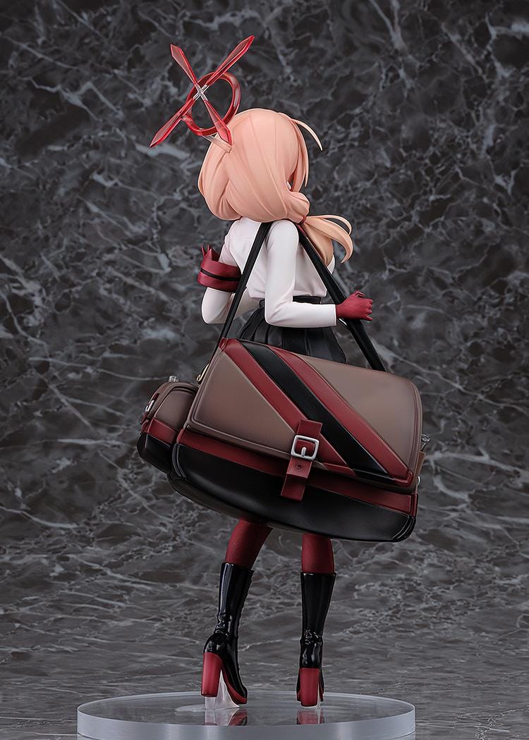 Blue Archive Chinatsu 1/7 Scale Figure featuring Chinatsu with pink hair, glasses, red gloves, halo detail, weapon accessory, and a large bag.