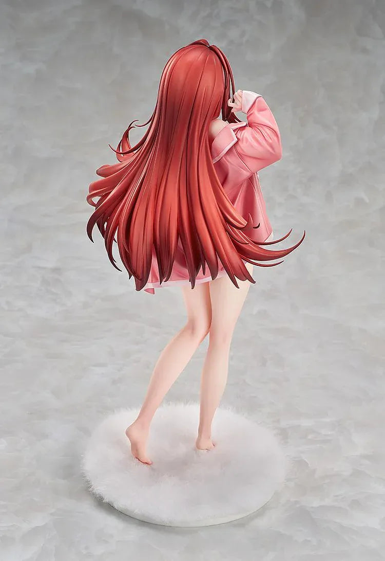 GODDESS OF VICTORY: NIKKE Rapi: Red Hood Cherished Red 1/7 scale figure wearing dark sleepwear and a pink cardigan while holding a pillow.