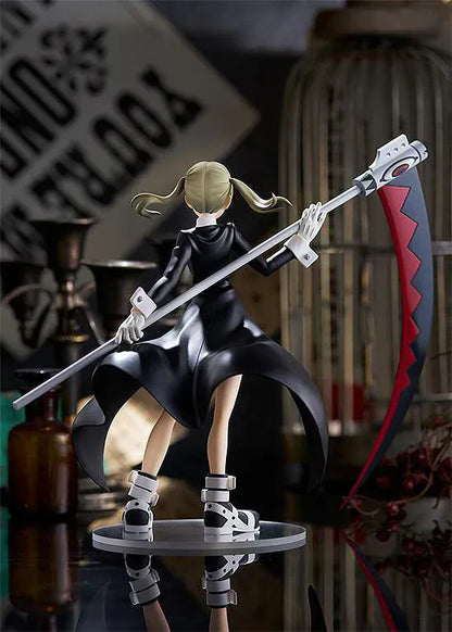 Soul Eater Pop Up Parade Maka Albarn re-run figure holding large red-and-black scythe with flowing black coat and plaid skirt