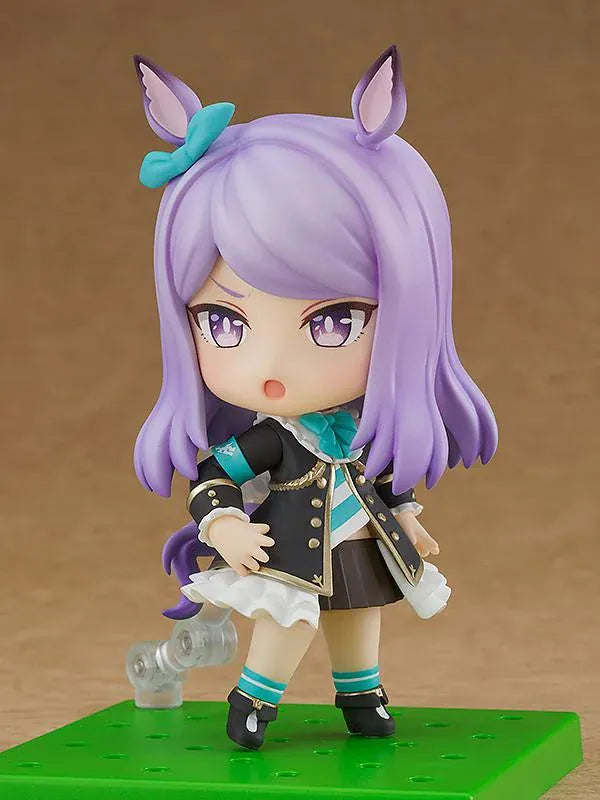 Umamusume Pretty Derby Nendoroid Mejiro McQueen rerelease figure with lavender hair, horse ears, and a black-and-teal racing uniform.
