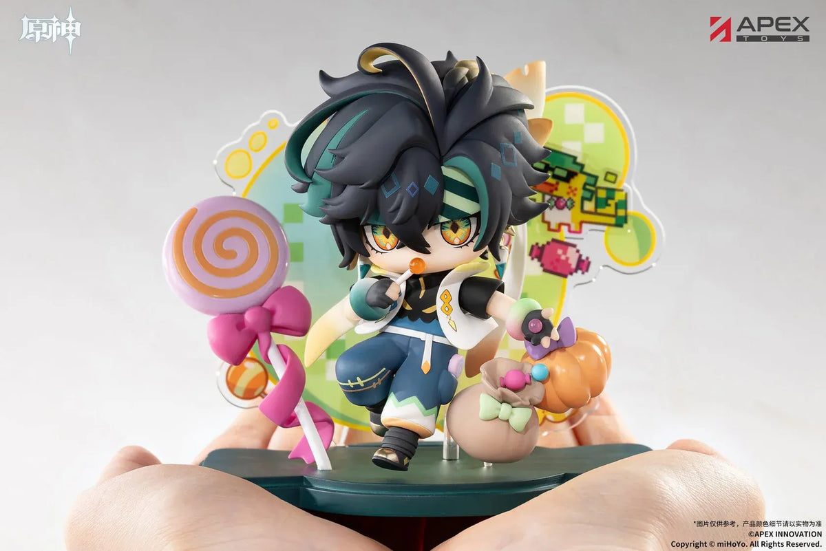 Genshin Impact You Ye Qi Xiang Series chibi Kinich figure holding a lollipop, surrounded by candy, a pumpkin, and a pixel-art backdrop.