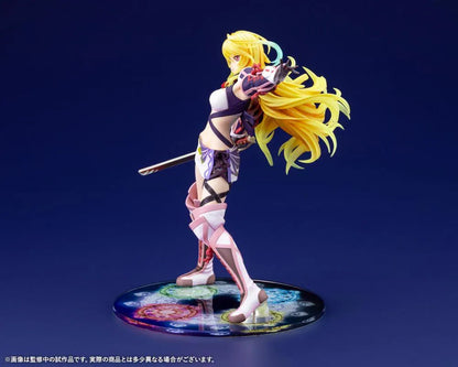 Tales of Xillia Milla Maxwell 1/8 scale figure holding a sword in a battle pose on a colorful elemental display base.