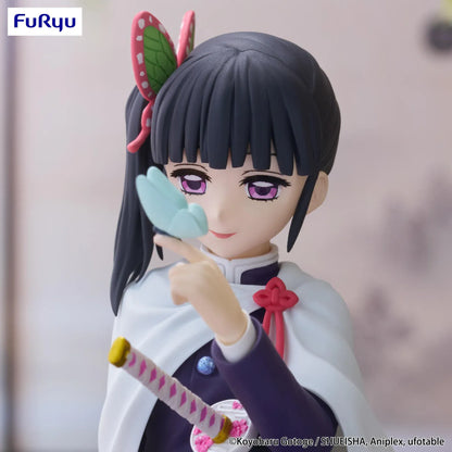 Kanao Tsuyuri Noodle Stopper figure seated in her Demon Slayer uniform and white cape while holding a blue butterfly.