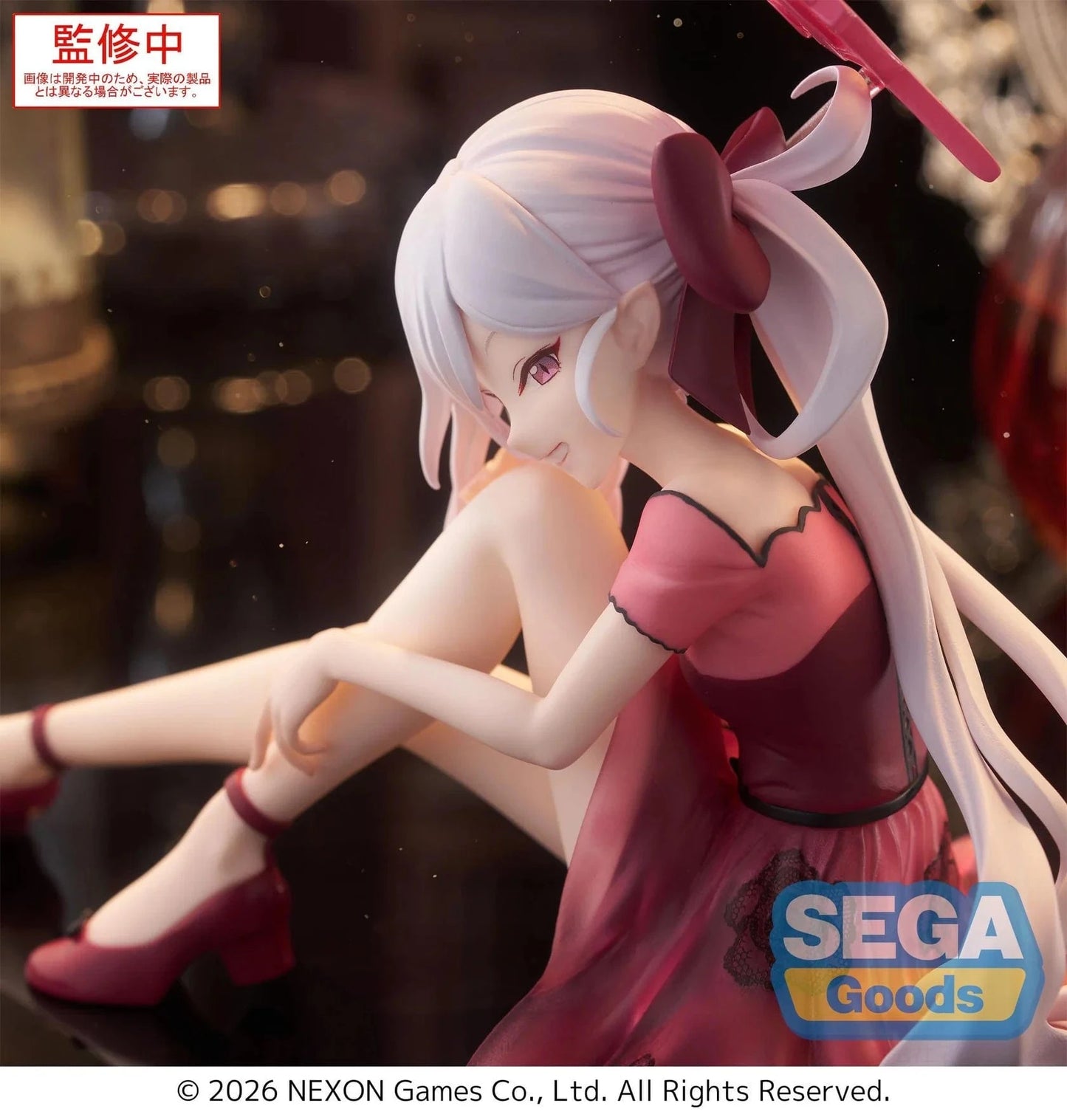 Blue Archive Yumemirize Mutsuki figure sitting in red dress with silver hair and playful expression