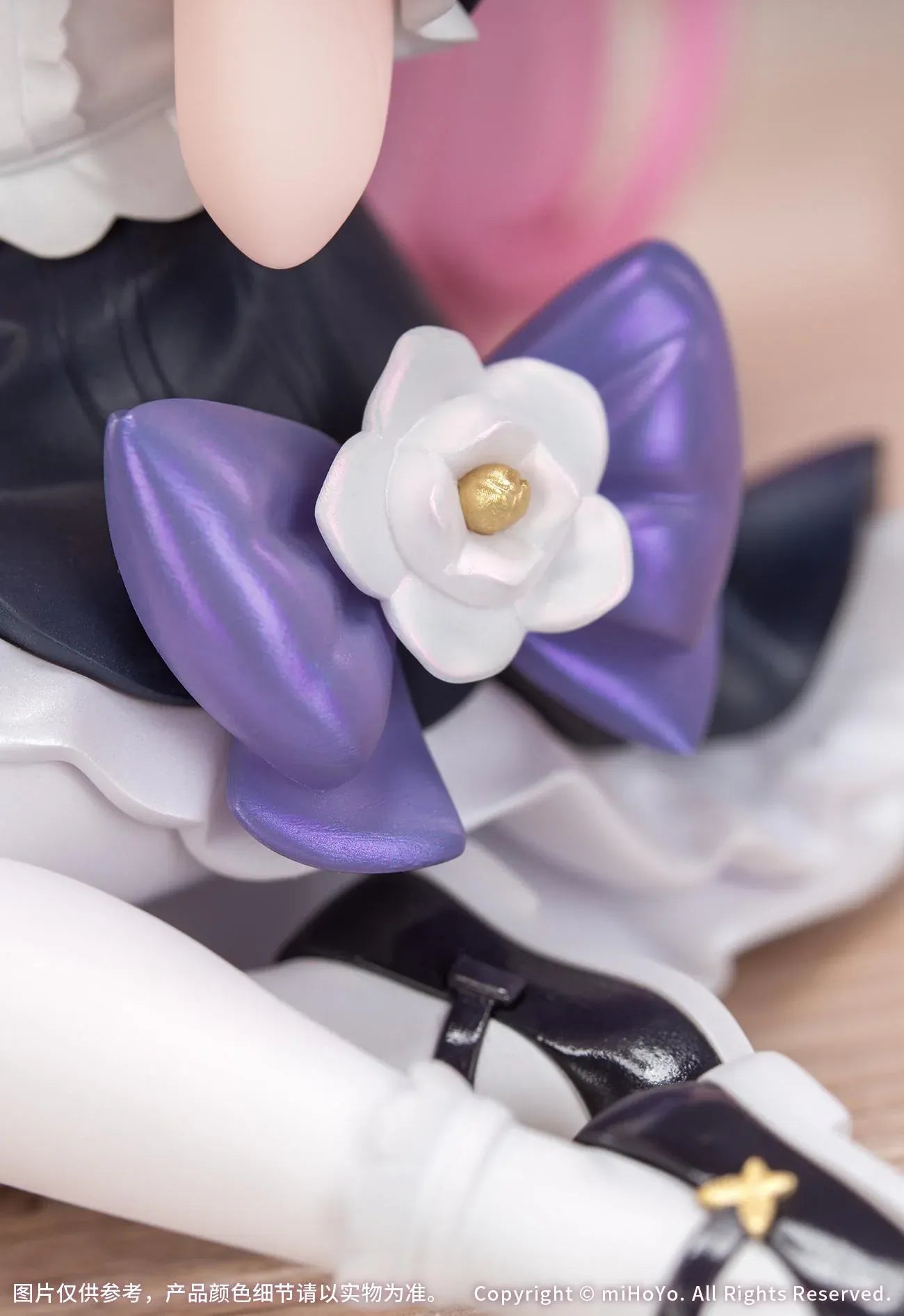 Honkai Impact 3rd Little Series Elysia Little Flame-Chaser Ver. Figure featuring Elysia with pink hair, chibi styling, black-and-white outfit, purple bow accents, and pastel heart cushion.