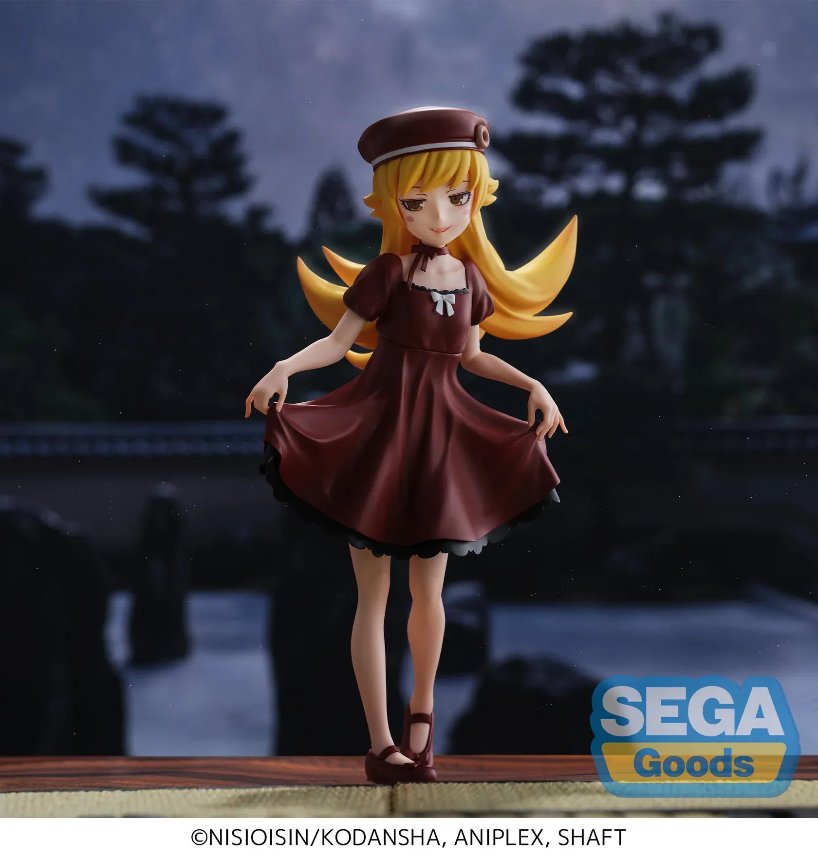Monogatari High Premium Figure Shinobu Oshino Figure wearing a burgundy dress and hat with golden hair