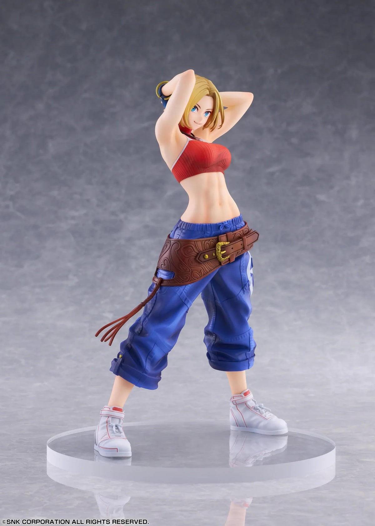 Blue Mary Limited Edition 1/7 scale figure wearing a red crop top, blue pants, brown belt, and white sneakers in a confident standing pose.