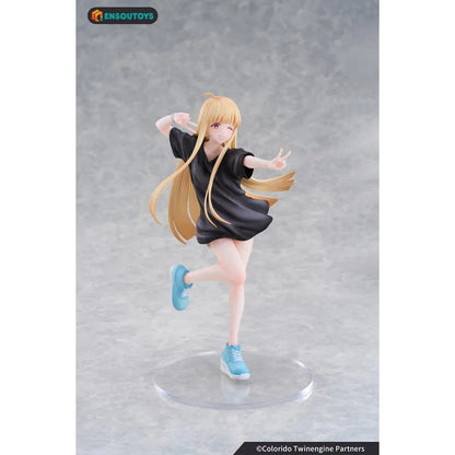 Kaguya In the Real World Ver. 1/7 scale figure with flowing blonde hair, a black outfit, blue sneakers, and a winking peace-sign pose.