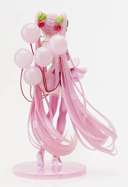 Sakura Miku figure with long pink twin-tails, cherry hair ornaments, a white and pink outfit, pink boots, and translucent balloons on a floral pink base.