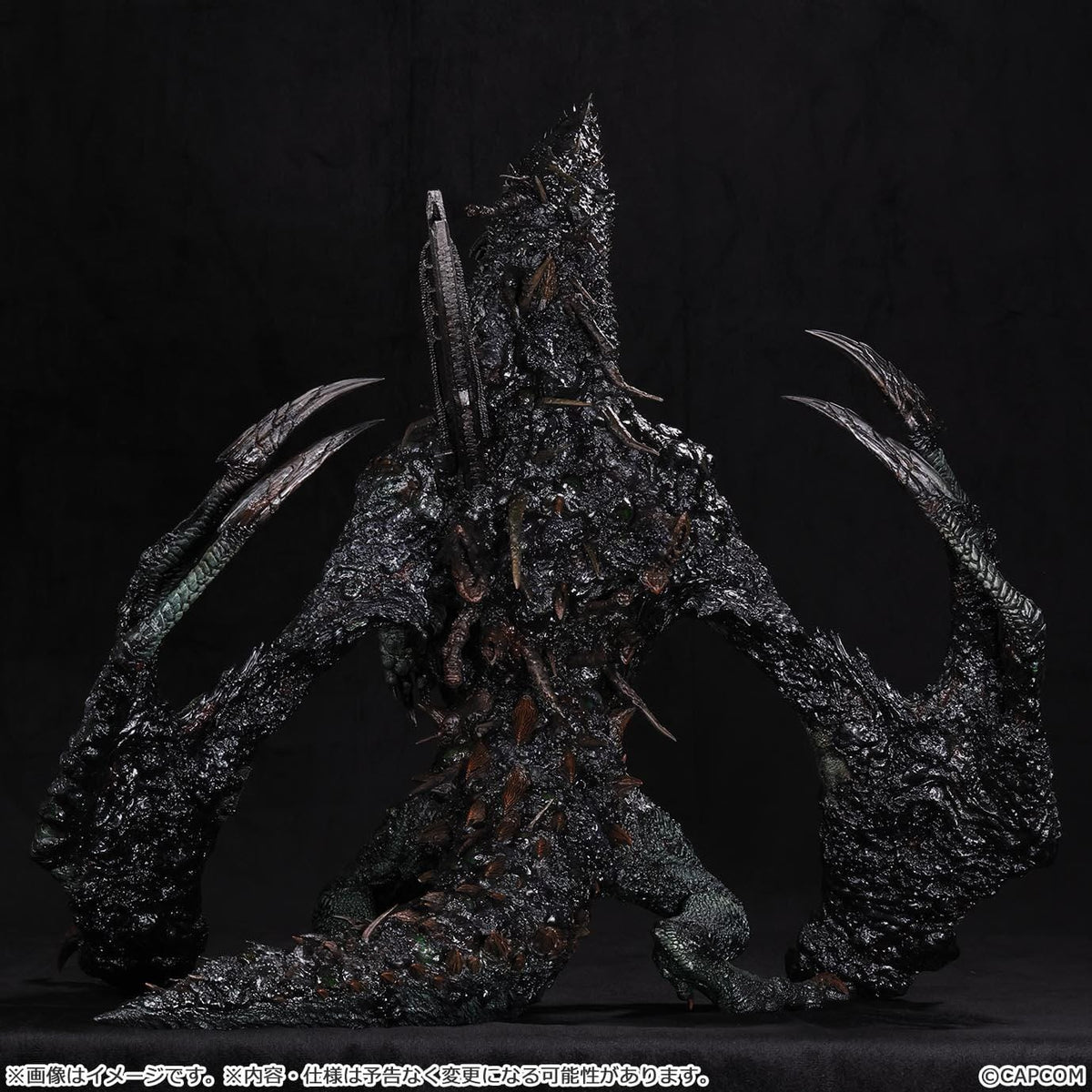 Monster Hunter Gogmazios Creator's Model XL figure roaring with dark textured scales, jagged spines, large claws, and red-orange chest accents.