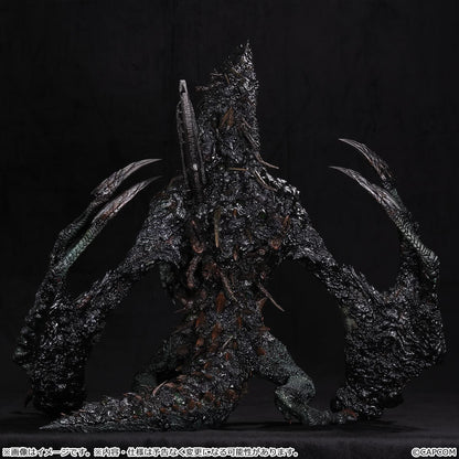 Monster Hunter Gogmazios Creator's Model XL figure roaring with dark textured scales, jagged spines, large claws, and red-orange chest accents.