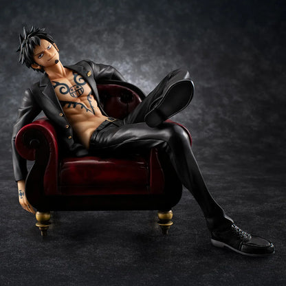 One Piece Portrait Of Pirates S.O.C. Trafalgar Law Ver. R Figure wearing a black suit and sitting in a red armchair
