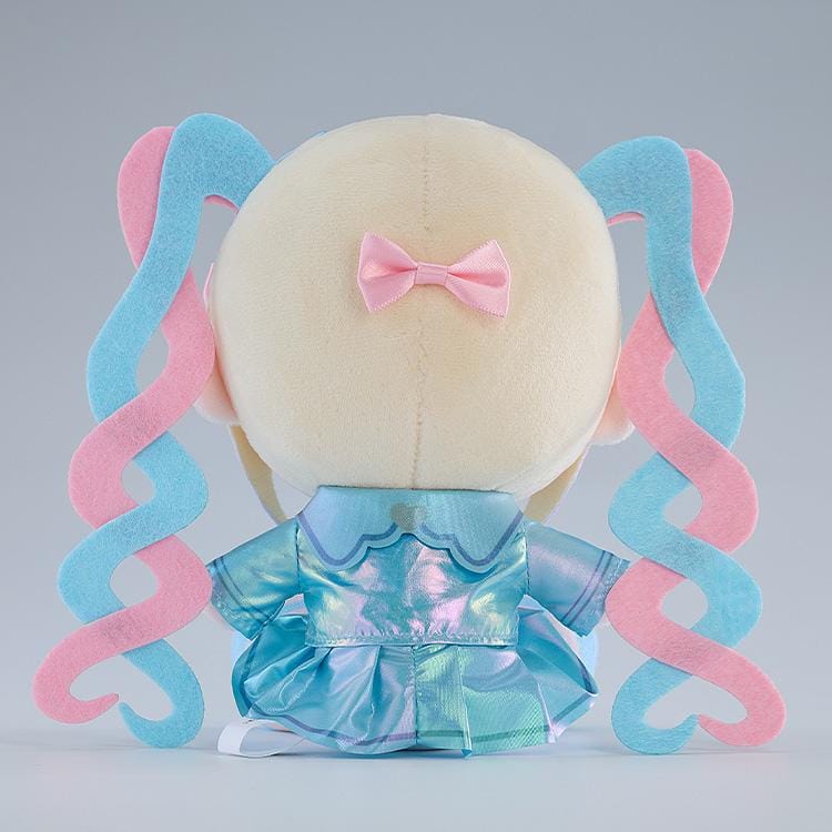 NEEDY GIRL OVERDOSE OMGkawaiiAngel Punipuni plushie with pink and blue spiral twin-tails, embroidered blue eyes, and a shimmering blue outfit.