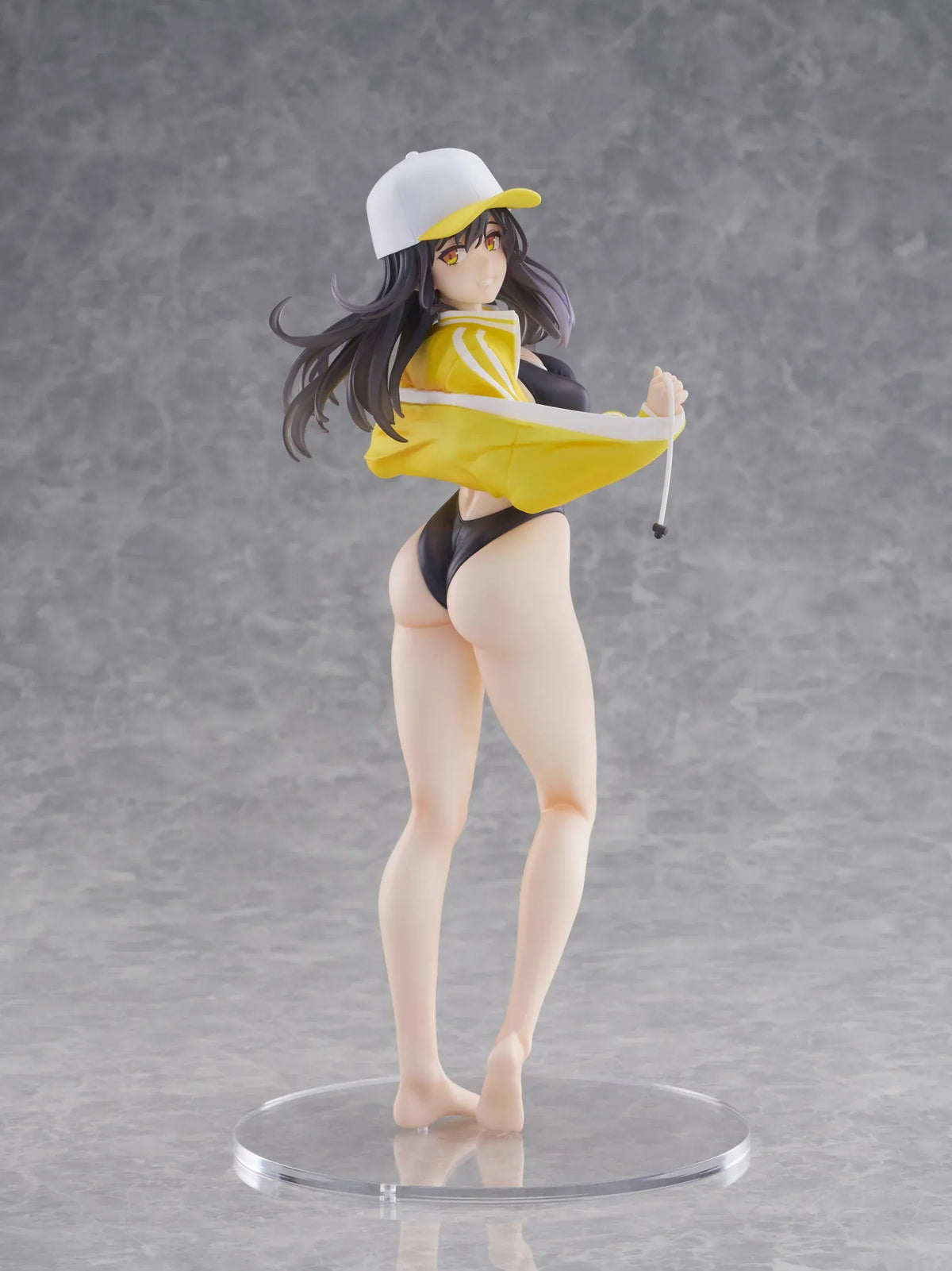 KoiKoi Sakura Kyou kara Suieibu Komon no Tama-chan Sensei 1/6 Scale Figure featuring a dark-haired anime woman with golden eyes wearing a black swimsuit, yellow athletic jacket, and white cap with a yellow brim, posing barefoot on a transparent circular base.