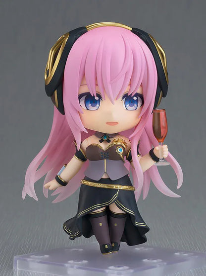 Hatsune Miku Nendoroid Megurine Luka V4X Figure with pink hair, headset, blue eyes, and black and gold Vocaloid outfit