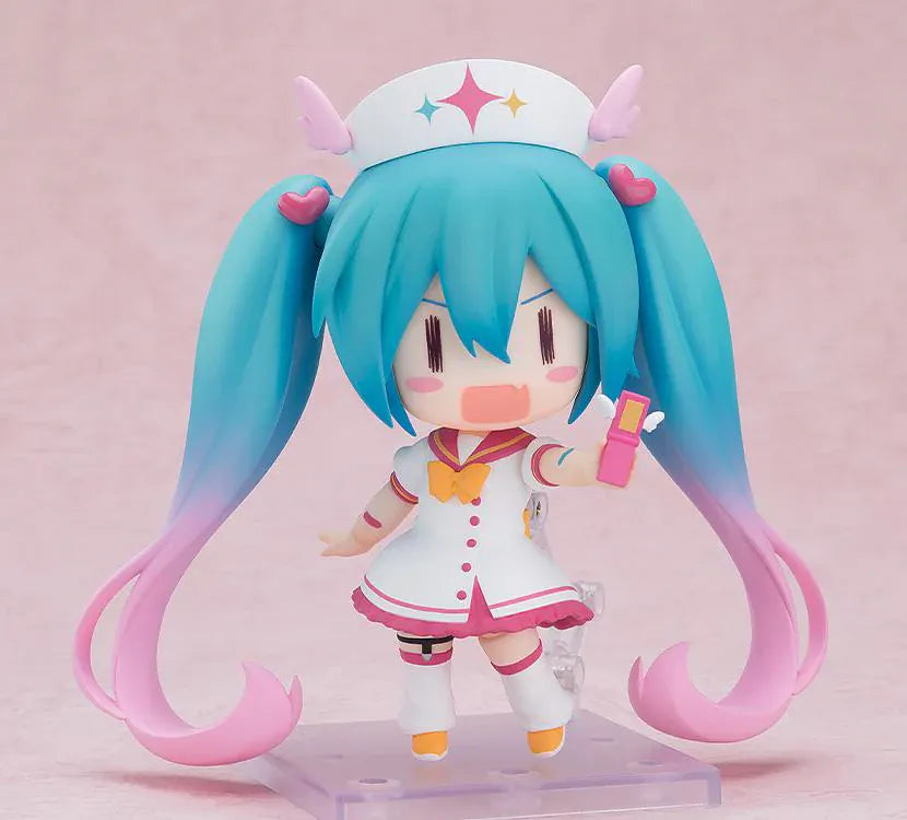 Hatsune Miku Nendoroid MAGICAL CURE LOVE SHOT Figure with teal pink twin-tails, magical nurse outfit, heart details, and starry eyes